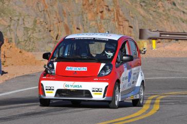 2012 PPIHC Practice Day Two.An essentially stock version of the electric-powered 2012 Mitsubishi i, driven by International off-road series race-winning driver Beccy Gordon, in a practice run in the middle section of the 2012 Pikes Peak International Hill Climb.