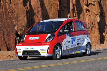 2012 PPIHC Practice Day Two.An essentially stock version of the electric-powered 2012 Mitsubishi i, driven by International off-road series race-winning driver Beccy Gordon, in a practice run in the middle section of the 2012 Pikes Peak International Hill Climb.