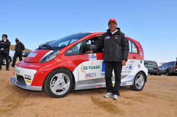 Two-time Paris-Dakar Rally champion Hiroshi Masuoka races an advanced race-spec version of the Mitsubishi i - the i-MiEV Evolution - in the 2012 Pikes Peak International Hill Climb.