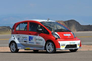 2012 PPIHC Practice Day Three - An essentially stock version of the electric-powered 2012 Mitsubishi i, driven by International off-road series race-winning driver Beccy Gordon in a practice run at the 2012 Pikes Peak International Hill Climb.