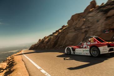 A pair of 100% electric-powered MiEV Evolution II race cars prepare for the 2013 Pikes Peak International Hill Climb (PPIHC) on June 30th Colorado Springs, CO. Two-time Dakar Rally overall champion Hiroshi Masuoka returns, this year with six-time Pikes Peak overall motorcycle champion Greg Tracy.
