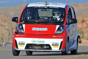 2012 PPIHC Practice Day Three - An essentially stock version of the electric-powered 2012 Mitsubishi i, driven by International off-road series race-winning driver Beccy Gordon in a practice run at the 2012 Pikes Peak International Hill Climb.