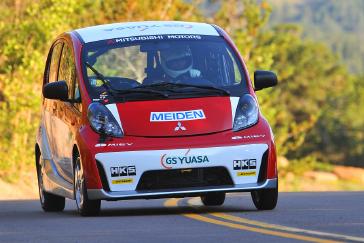 2012 PPIHC Practice Day One .An essentially stock version of the electric-powered 2012 Mitsubishi i, driven by Beccy Gordon, in a practice run on the lower section (Starting Line to Glen Cove) of the 2012 Pikes Peak International Hill Climb.
